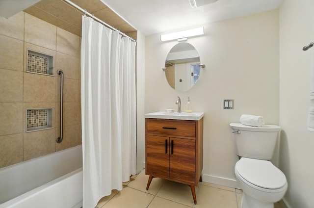 1126 Audubon Rd, Park Hills, KY 41011 - bathroom featuring tile patterned floors, toilet, vanity, shower / tub combo, and baseboards