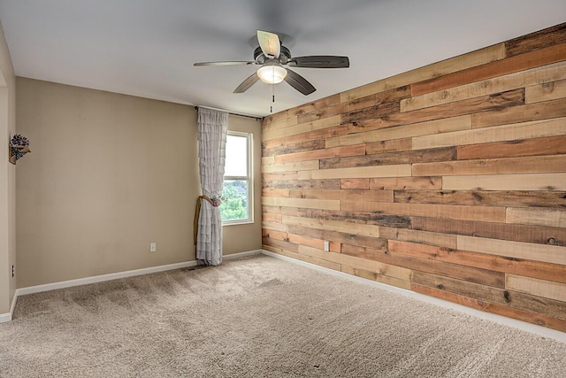 1514 Twinridge Way, Independence, KY 41051 - spare room featuring wooden walls, a ceiling fan, baseboards, and carpet flooring