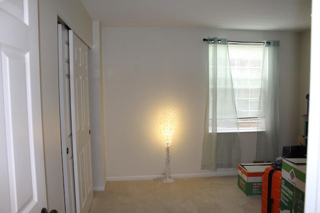 515 Telescope Vw Unit 103, Wilder, KY 41076 - unfurnished bedroom featuring carpet and baseboards