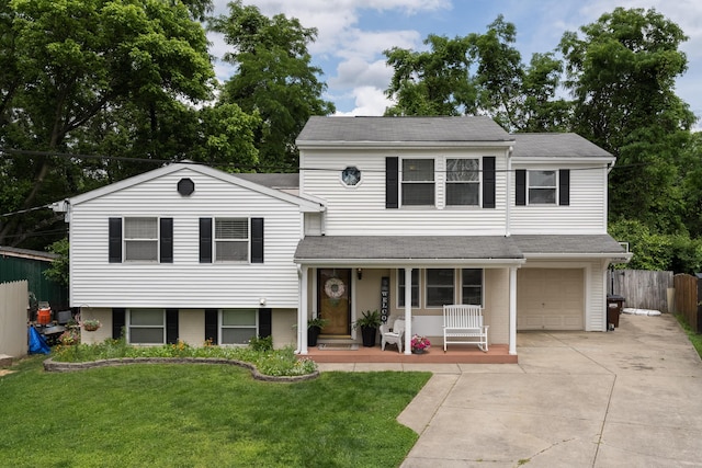 3350 Redbud Ct, Erlanger, KY 41018 - tri-level home with a porch, concrete driveway, an attached garage, and a shingled roof