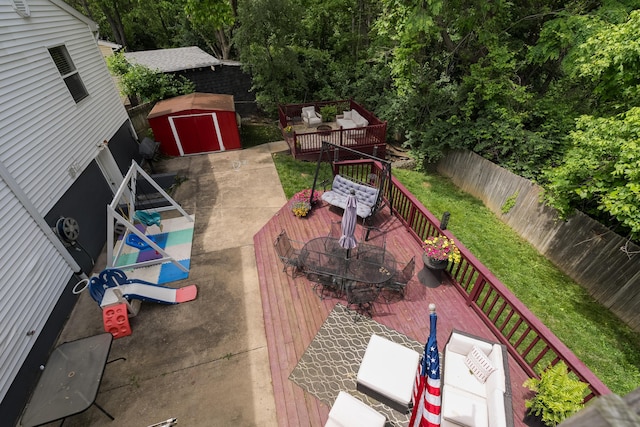 3350 Redbud Ct, Erlanger, KY 41018 - wooden deck with outdoor dining area, a fenced backyard, and an outdoor hangout area