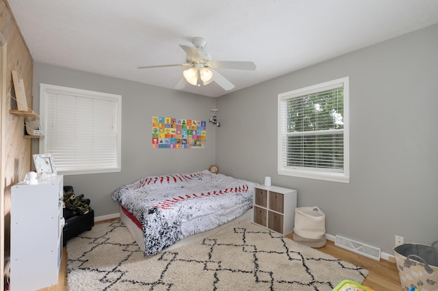 3350 Redbud Ct, Erlanger, KY 41018 - bedroom with baseboards, a ceiling fan, and wood finished floors