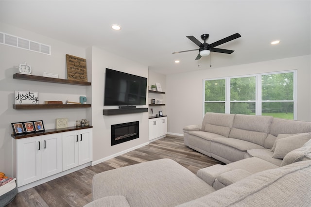 505 Fords Mill Rd, Dry Ridge, KY 41035 - living area featuring a glass covered fireplace, dark wood-style floors, a ceiling fan, recessed lighting, and baseboards