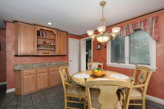 871 Bristow Rd, Independence, KY 41051 - dining space with a chandelier, baseboards, dark tile patterned flooring, and recessed lighting