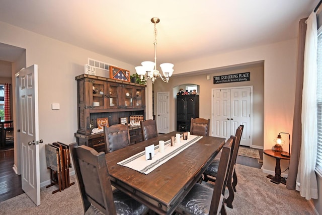 10113 Lapalco Ct, Union, KY 41091 - dining area featuring a chandelier, carpet flooring, and baseboards