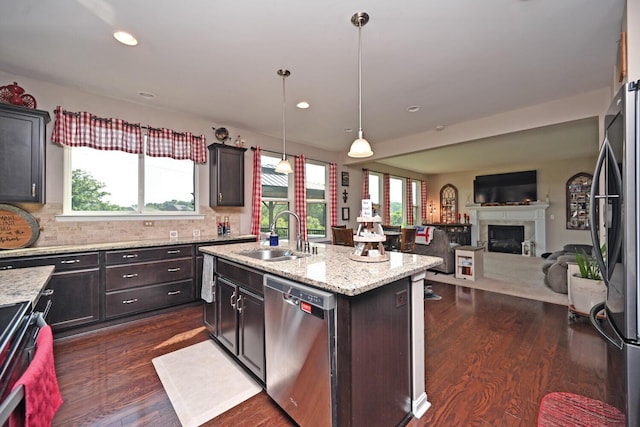 10113 Lapalco Ct, Union, KY 41091 - kitchen with appliances with stainless steel finishes, a sink, dark wood-style floors, healthy amount of natural light, and recessed lighting