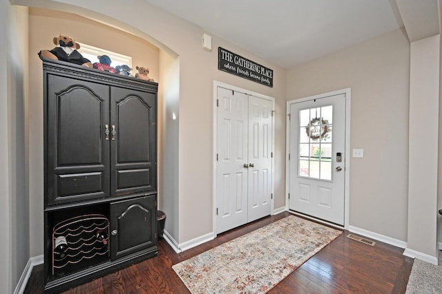 10113 Lapalco Ct, Union, KY 41091 - entryway featuring dark wood-style flooring, baseboards, and arched walkways