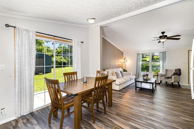 566 Sycamore St, Crescent Springs, KY 41017 - dining room with crown molding, dark wood-type flooring, a textured ceiling, ceiling fan, and lofted ceiling