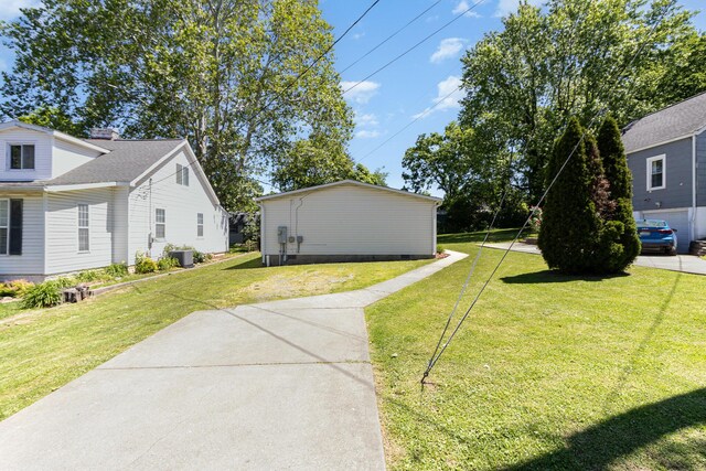 566 Sycamore St, Crescent Springs, KY 41017 - view of green lawn with cooling unit