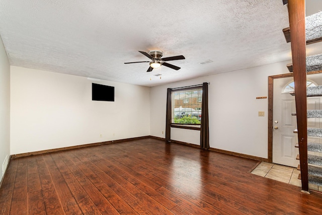 6753 Curtis Way, Florence, KY 41042 - spare room with hardwood / wood-style floors, ceiling fan, baseboards, stairs, and a textured ceiling