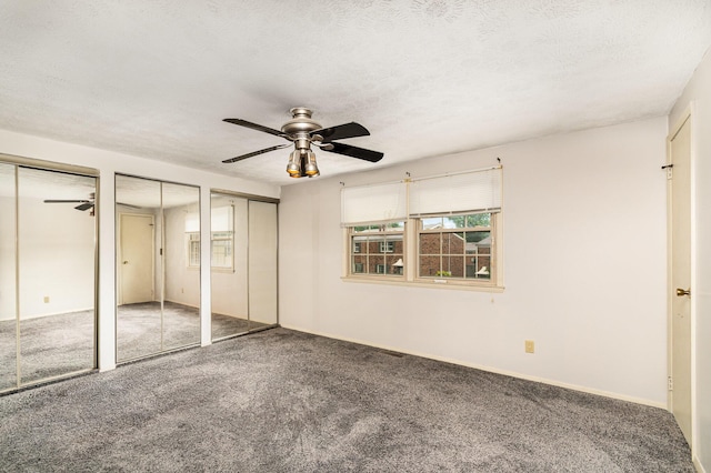 6753 Curtis Way, Florence, KY 41042 - unfurnished bedroom featuring multiple closets, carpet floors, a textured ceiling, and a ceiling fan