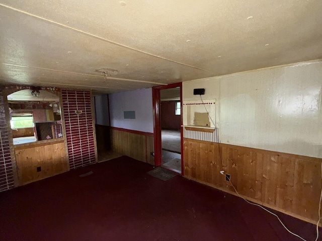 12544 Klein Rd, Morning View, KY 41063 - empty room featuring wooden walls, wainscoting, and a fireplace