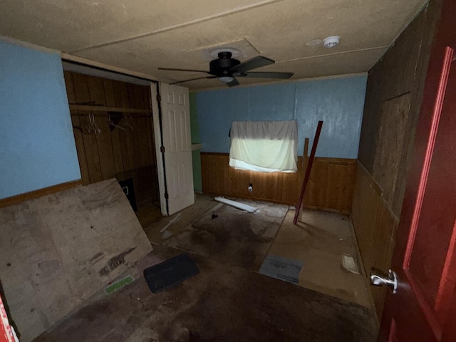 12544 Klein Rd, Morning View, KY 41063 - unfurnished bedroom featuring a wainscoted wall, wood walls, and a closet