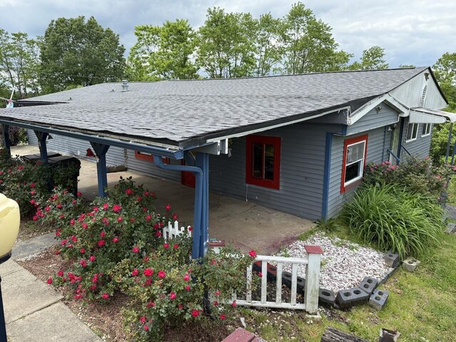 12544 Klein Rd, Morning View, KY 41063 - view of side of property featuring roof with shingles and a patio area