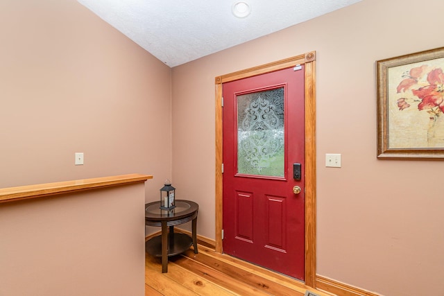 1019 Fisher Rd, Foster, KY 41043 - entrance foyer with light wood-style floors and baseboards