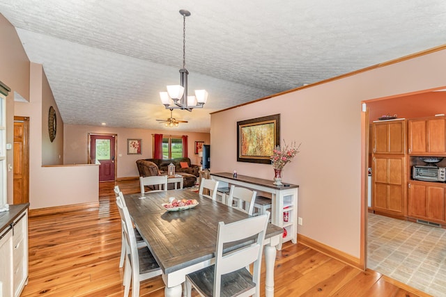 1019 Fisher Rd, Foster, KY 41043 - dining space with a chandelier, light wood-style flooring, and baseboards
