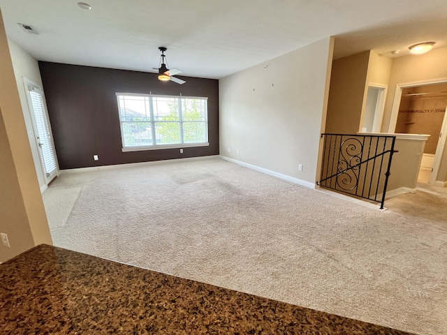 1859 Riverpointe Ct Unit 11, Dayton, KY 41074 - unfurnished room with carpet flooring, a ceiling fan, and baseboards