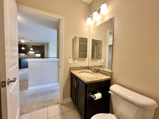 1859 Riverpointe Ct Unit 11, Dayton, KY 41074 - bathroom with toilet, tile patterned flooring, vanity, and baseboards