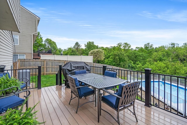 21 Laurel Ridge Dr, Alexandria, KY 41001 - wooden deck with outdoor dining area and a fenced backyard
