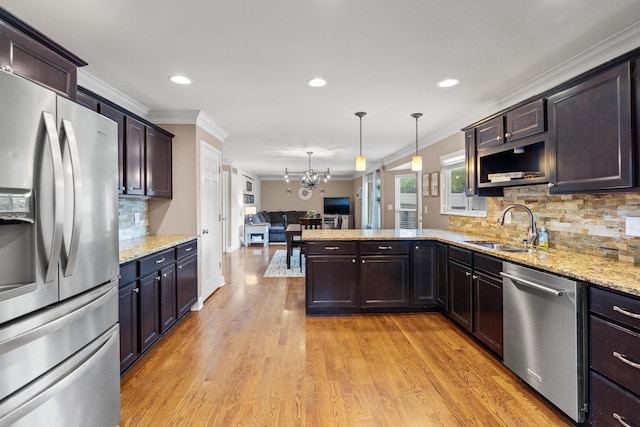 21 Laurel Ridge Dr, Alexandria, KY 41001 - kitchen featuring appliances with stainless steel finishes, ornamental molding, a sink, a chandelier, and a peninsula