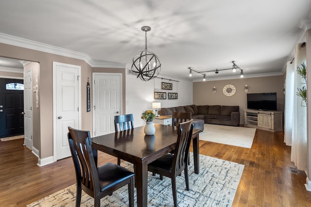 21 Laurel Ridge Dr, Alexandria, KY 41001 - dining room featuring crown molding, a chandelier, dark wood finished floors, and baseboards