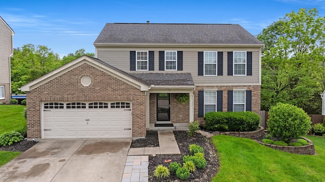 21 Laurel Ridge Dr, Alexandria, KY 41001 - traditional-style home with concrete driveway, brick siding, a front lawn, and an attached garage
