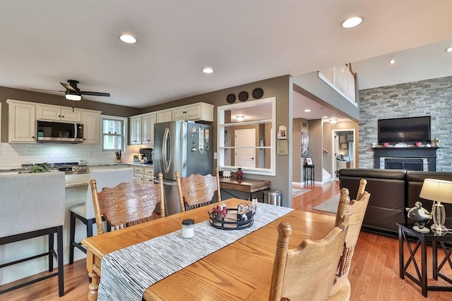 445 Elk Lake Resort Rd Unit 882, Owenton, KY 40359 - dining space with light wood-style flooring, ceiling fan, and recessed lighting