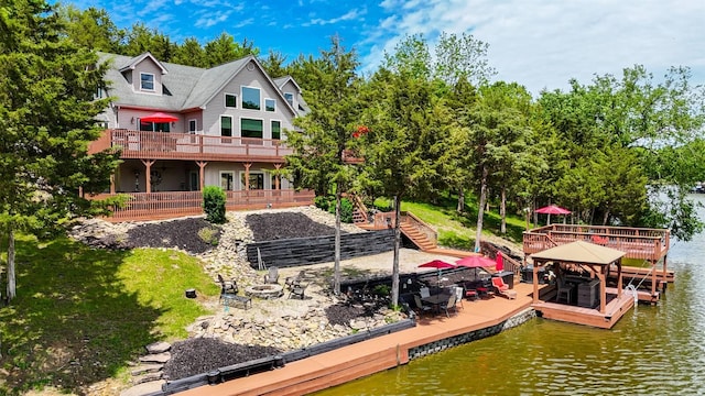 445 Elk Lake Resort Rd Unit 882, Owenton, KY 40359 - back of property featuring an outdoor fire pit, stairs, and a deck with water view
