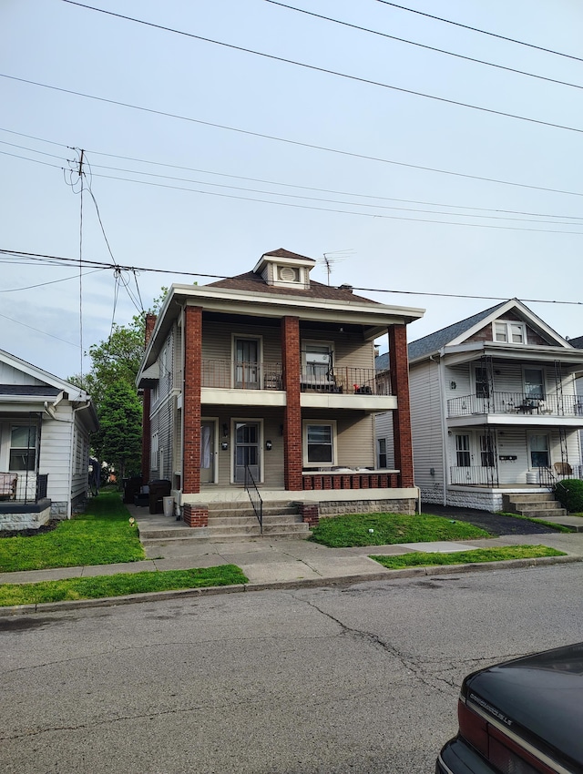 30 W 36th St W, Covington, KY 41015 - townhome / multi-family property with covered porch and a balcony