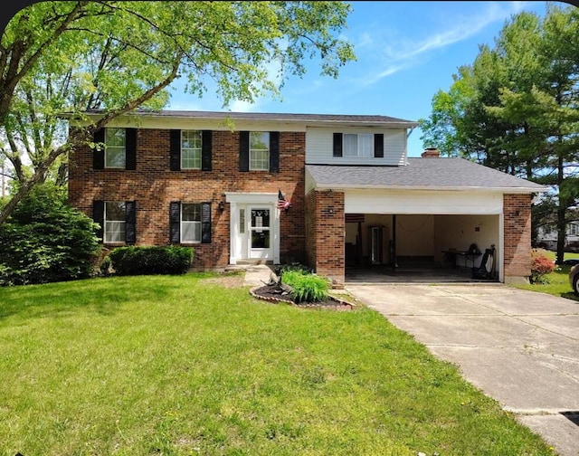 6400 Thistlewood Ln, Burlington, KY 41005 - view of front of property featuring concrete driveway, a front lawn, brick siding, a chimney, and a garage