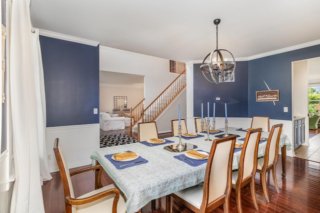 8394 Saint Louis Blvd, Union, KY 41091 - dining area with a chandelier, stairway, a wainscoted wall, wood finished floors, and crown molding