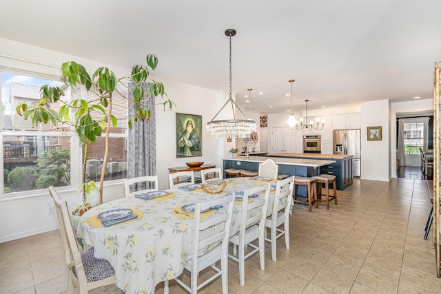 8394 Saint Louis Blvd, Union, KY 41091 - dining space with a chandelier, light tile patterned floors, baseboards, and recessed lighting
