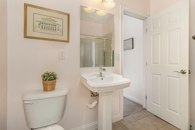 8394 Saint Louis Blvd, Union, KY 41091 - full bath with toilet, tile patterned floors, a shower stall, and baseboards