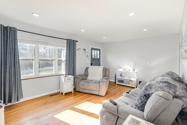 1634 Highland Pike, Fort Wright, KY 41011 - living room featuring healthy amount of natural light, light wood-style floors, recessed lighting, and baseboards