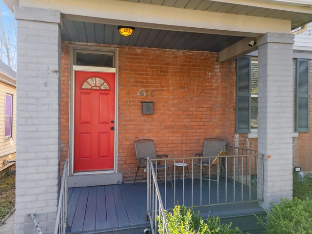 615 Highland Pike, Covington, KY 41014 - doorway to property featuring brick siding