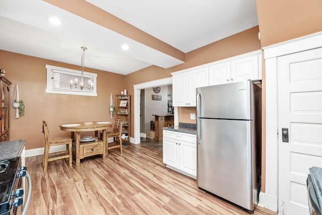 615 Highland Pike, Covington, KY 41014 - kitchen with stainless steel appliances, baseboards, white cabinetry, and recessed lighting