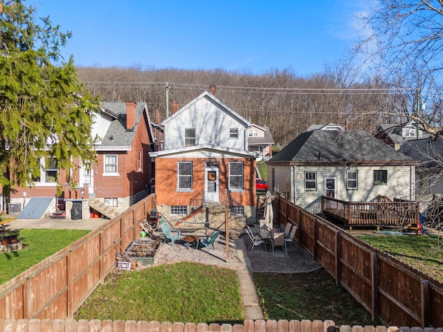 615 Highland Pike, Covington, KY 41014 - back of house with a wooden deck