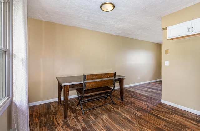 1750 Walnut Lick Rd, Verona, KY 41092 - dining room featuring dark wood-style floors, a textured ceiling, and baseboards