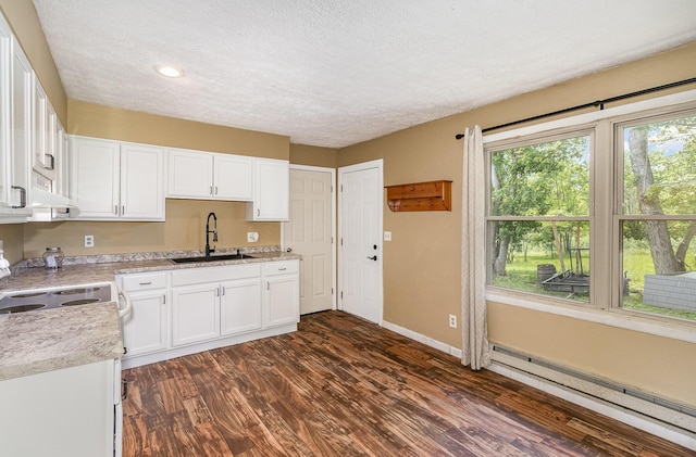 1750 Walnut Lick Rd, Verona, KY 41092 - kitchen with a sink, a baseboard heating unit, a textured ceiling, dark wood-style floors, and white cabinets