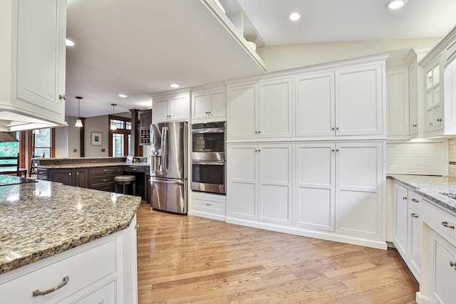 721 Dudley Rd, Edgewood, KY 41017 - kitchen with appliances with stainless steel finishes, white cabinets, light wood-type flooring, and recessed lighting