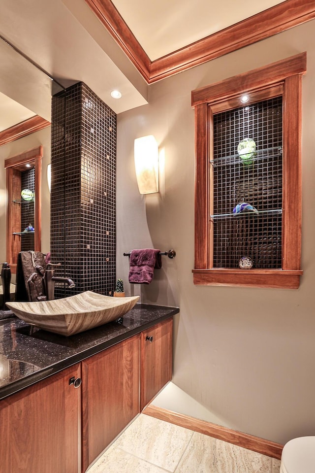 721 Dudley Rd, Edgewood, KY 41017 - bathroom with ornamental molding, vanity, toilet, and baseboards