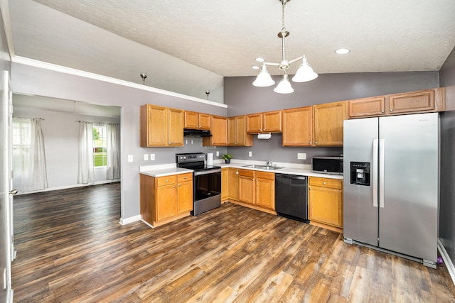 92 High St, Walton, KY 41094 - kitchen featuring stainless steel appliances, under cabinet range hood, light countertops, high vaulted ceiling, and a chandelier