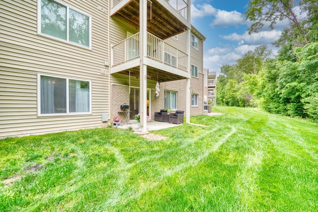 5913 Boulder Vw, Cold Spring, KY 41076 - back of house with a balcony, a patio, a yard, an outdoor hangout area, and brick siding
