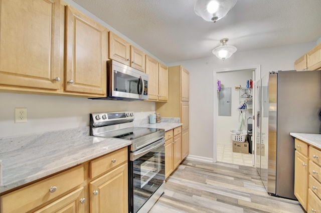 5913 Boulder Vw, Cold Spring, KY 41076 - kitchen featuring appliances with stainless steel finishes, light brown cabinetry, light wood-type flooring, electric panel, and light stone counters