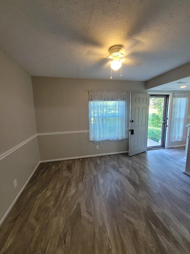 122 Whitney Ct, Crestview Hills, KY 41017 - unfurnished room featuring dark wood-style flooring, a textured ceiling, and ceiling fan
