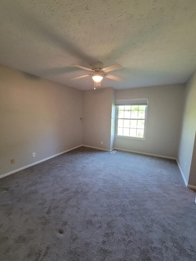 122 Whitney Ct, Crestview Hills, KY 41017 - spare room with a ceiling fan, dark carpet, and a textured ceiling