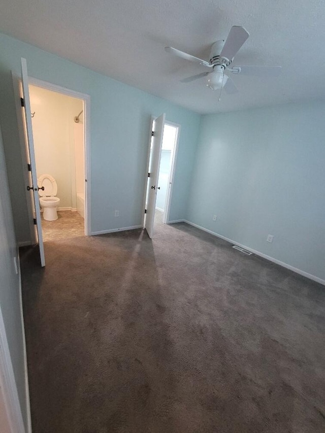 218 Shaker Heights Ln, Crestview Hills, KY 41017 - unfurnished bedroom with ensuite bath, dark colored carpet, and a ceiling fan
