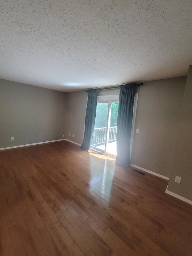 218 Shaker Heights Ln, Crestview Hills, KY 41017 - unfurnished room featuring a textured ceiling and wood finished floors
