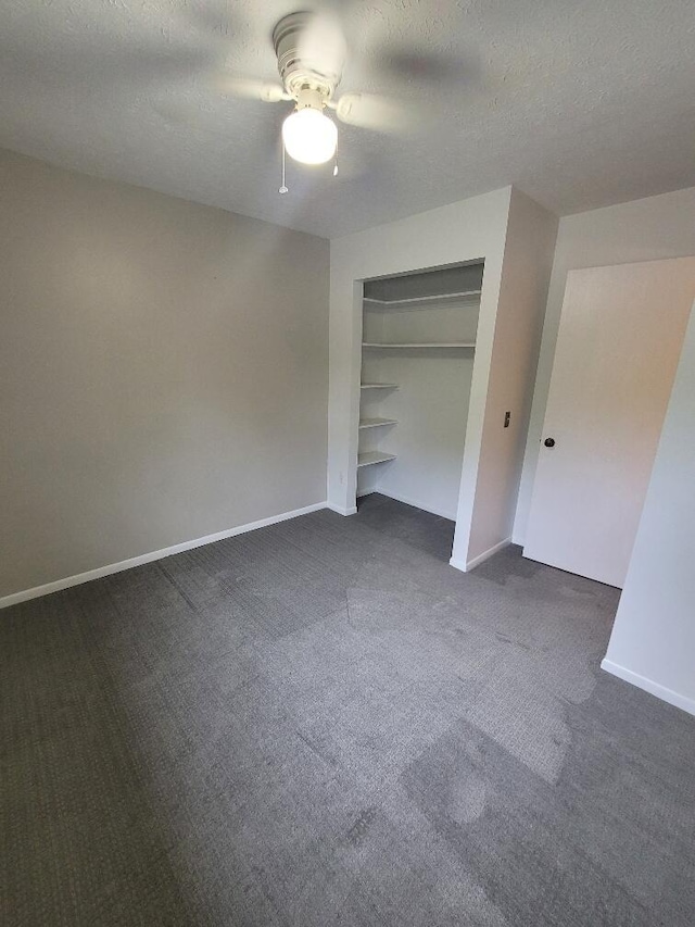 152 Steelway Farm Ct, Crestview Hills, KY 41017 - unfurnished bedroom featuring dark colored carpet, a textured ceiling, ceiling fan, and a closet