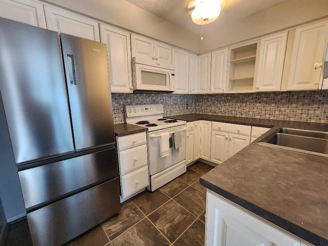 152 Steelway Farm Ct, Crestview Hills, KY 41017 - kitchen featuring white appliances, dark countertops, white cabinets, and backsplash
